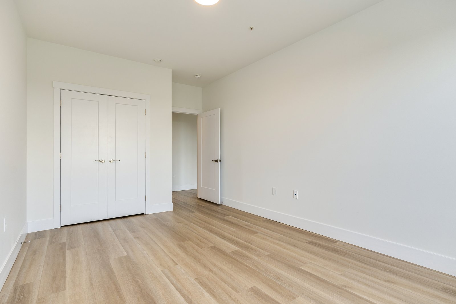 Bedroom with a double-door closet